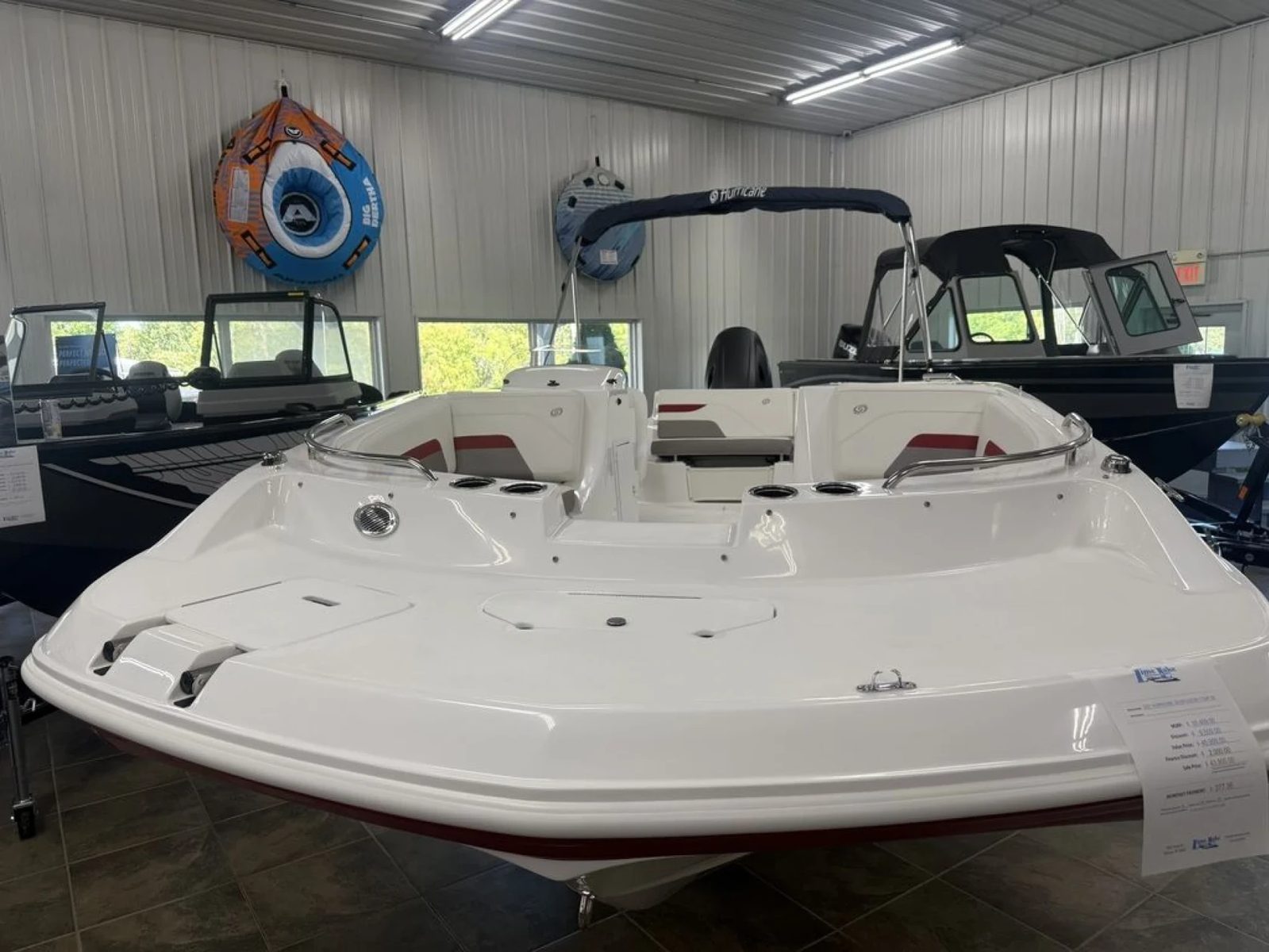 A Hurricane deck boat bow-on in the Lime Lake showroom