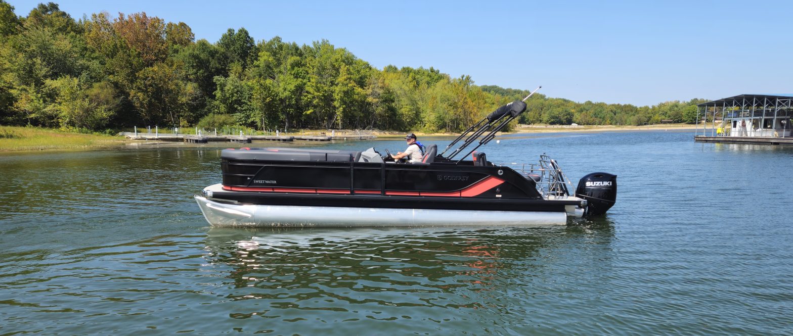 A Sweetwater pontoon on the water